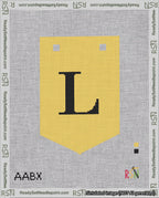 A taped needlepoint canvas with the design: Banner 18 mesh count Pointed L Black on Yellow.