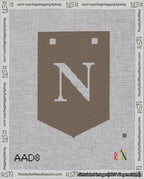 A taped needlepoint canvas with the design: Banner 18 mesh count Pointed N White on Brown.