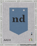 A taped needlepoint canvas with the design: Banner 18 mesh count Pointed nd Black on Blue.