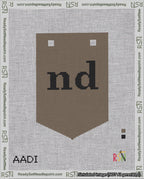 A taped needlepoint canvas with the design: Banner 18 mesh count Pointed nd Black on Brown.