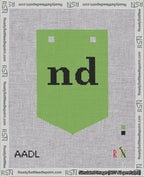 A taped needlepoint canvas with the design: Banner 18 mesh count Pointed nd Black on Light Green.