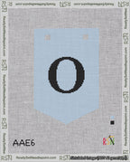 A taped needlepoint canvas with the design: Banner 18 mesh count Pointed O Black on Light Blue.