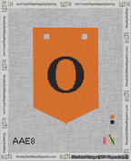 A taped needlepoint canvas with the design: Banner 18 mesh count Pointed O Black on Orange.