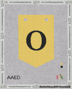 A taped needlepoint canvas with the design: Banner 18 mesh count Pointed O Black on Yellow.