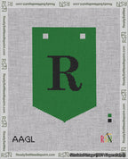 A taped needlepoint canvas with the design: Banner 18 mesh count Pointed R Black on Green.