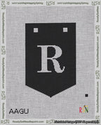 A taped needlepoint canvas with the design: Banner 18 mesh count Pointed R White on Black.