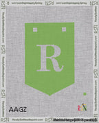 A taped needlepoint canvas with the design: Banner 18 mesh count Pointed R White on Light Green.
