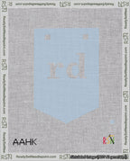 A taped needlepoint canvas with the design: Banner 18 mesh count Pointed rd White on Light Blue.