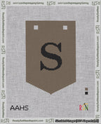 A taped needlepoint canvas with the design: Banner 18 mesh count Pointed S Black on Brown.
