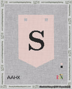 A taped needlepoint canvas with the design: Banner 18 mesh count Pointed S Black on Pink.