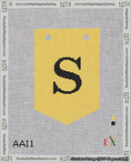 A taped needlepoint canvas with the design: Banner 18 mesh count Pointed S Black on Yellow.