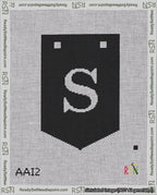 A taped needlepoint canvas with the design: Banner 18 mesh count Pointed S White on Black.