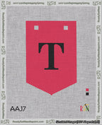 A taped needlepoint canvas with the design: Banner 18 mesh count Pointed T Black on Red.