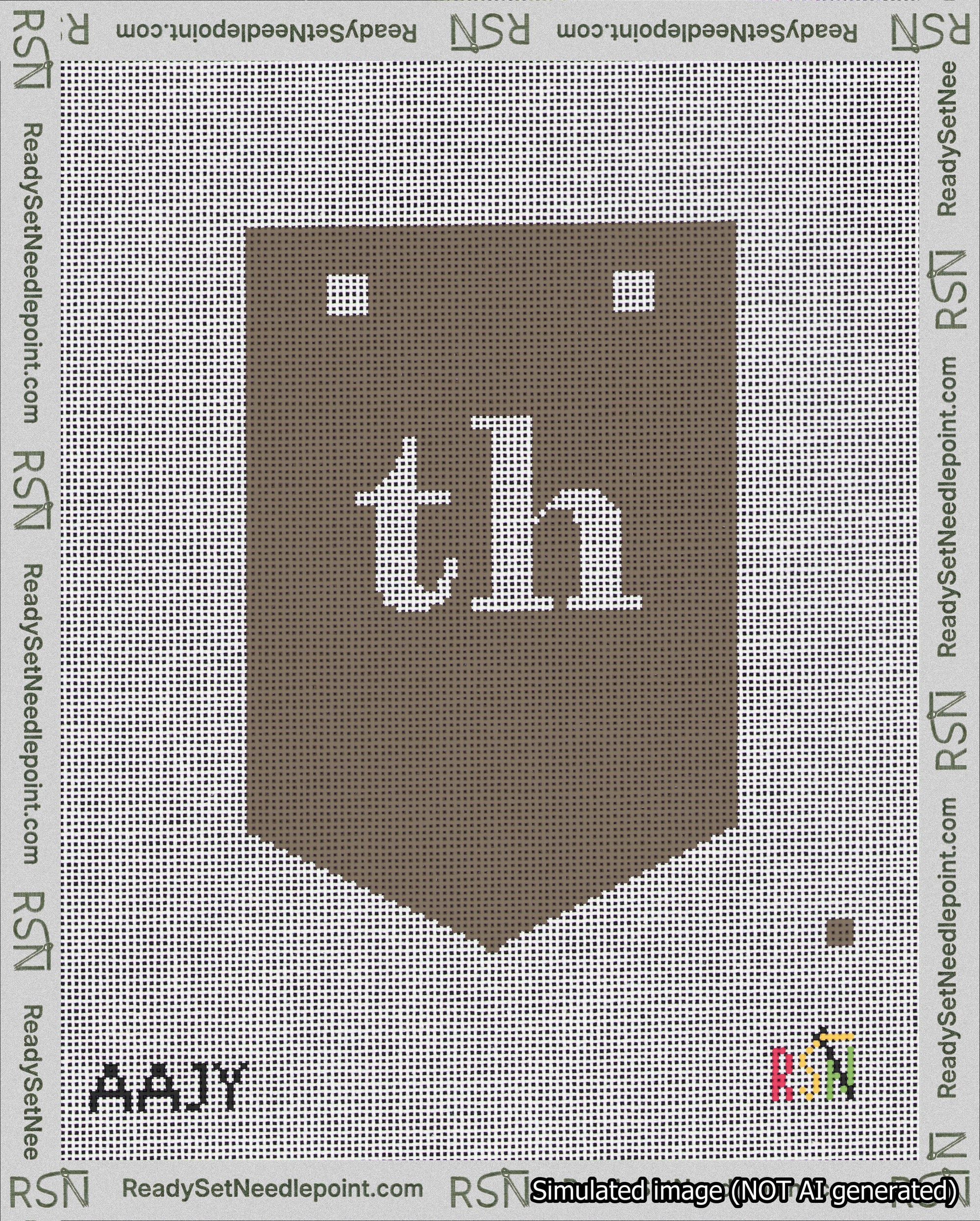A taped needlepoint canvas with the design: Banner 18 mesh count Pointed th White on Brown.
