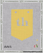 A taped needlepoint canvas with the design: Banner 18 mesh count Pointed th White on Yellow.