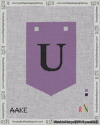 A taped needlepoint canvas with the design: Banner 18 mesh count Pointed U Black on Purple.