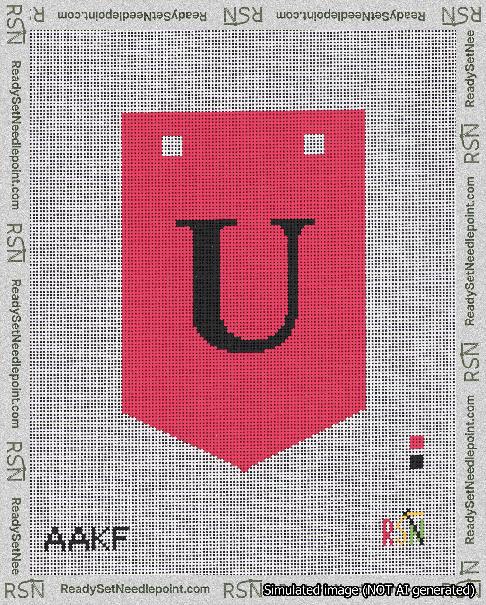 A taped needlepoint canvas with the design: Banner 18 mesh count Pointed U Black on Red.