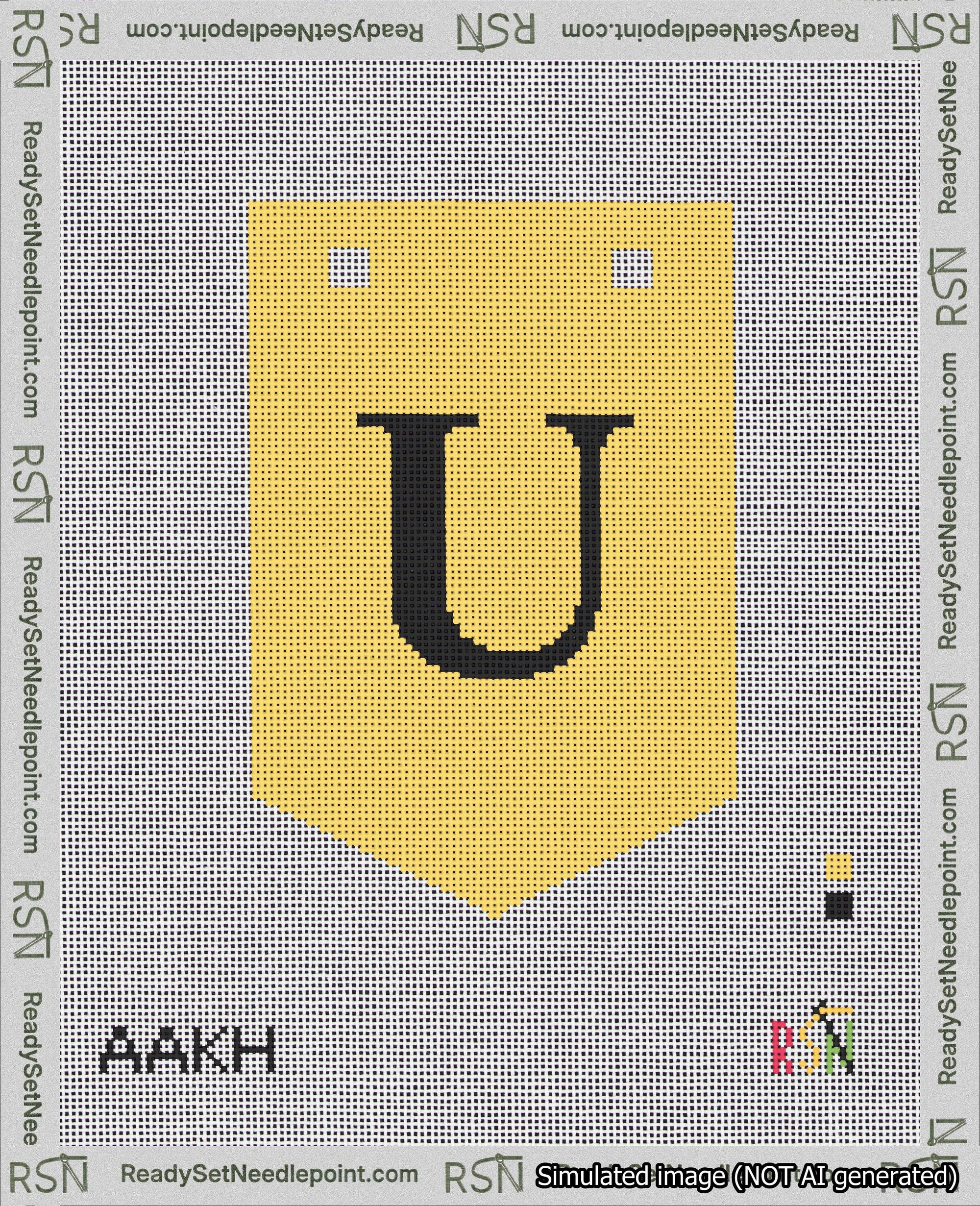A taped needlepoint canvas with the design: Banner 18 mesh count Pointed U Black on Yellow.