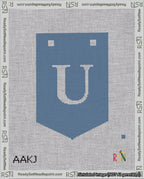 A taped needlepoint canvas with the design: Banner 18 mesh count Pointed U White on Blue.