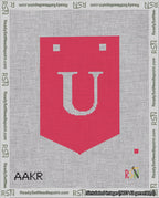 A taped needlepoint canvas with the design: Banner 18 mesh count Pointed U White on Red.