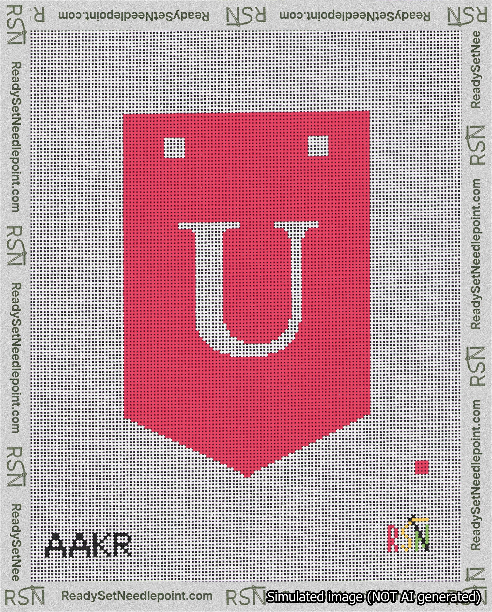 A taped needlepoint canvas with the design: Banner 18 mesh count Pointed U White on Red.