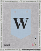 A taped needlepoint canvas with the design: Banner 18 mesh count Pointed W Black on Light Blue.