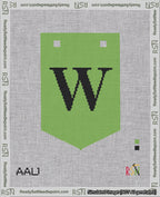 A taped needlepoint canvas with the design: Banner 18 mesh count Pointed W Black on Light Green.