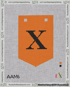 A taped needlepoint canvas with the design: Banner 18 mesh count Pointed X Black on Orange.