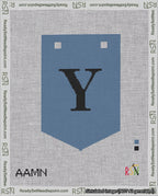 A taped needlepoint canvas with the design: Banner 18 mesh count Pointed Y Black on Blue.