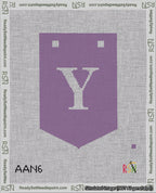 A taped needlepoint canvas with the design: Banner 18 mesh count Pointed Y White on Purple.