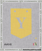A taped needlepoint canvas with the design: Banner 18 mesh count Pointed Y White on Yellow.