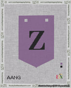 A taped needlepoint canvas with the design: Banner 18 mesh count Pointed Z Black on Purple.