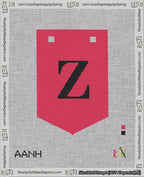 A taped needlepoint canvas with the design: Banner 18 mesh count Pointed Z Black on Red.