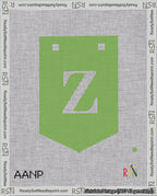 A taped needlepoint canvas with the design: Banner 18 mesh count Pointed Z White on Light Green.