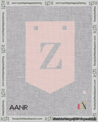 A taped needlepoint canvas with the design: Banner 18 mesh count Pointed Z White on Pink.