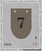 A taped needlepoint canvas with the design: Banner 18 mesh count Rounded 7 Black on Brown.