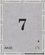 A taped needlepoint canvas with the design: Banner 18 mesh count Rounded 7 Black on White.