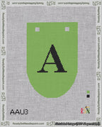 A taped needlepoint canvas with the design: Banner 18 mesh count Rounded A Black on Light Green.