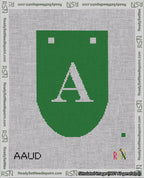A taped needlepoint canvas with the design: Banner 18 mesh count Rounded A White on Green.