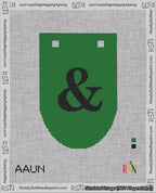 A taped needlepoint canvas with the design: Banner 18 mesh count Rounded Ampersand Black on Green.