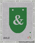 A taped needlepoint canvas with the design: Banner 18 mesh count Rounded Ampersand White on Green.
