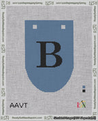 A taped needlepoint canvas with the design: Banner 18 mesh count Rounded B Black on Blue.