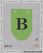 A taped needlepoint canvas with the design: Banner 18 mesh count Rounded B Black on Light Green.