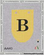 A taped needlepoint canvas with the design: Banner 18 mesh count Rounded B Black on Yellow.