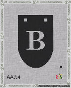 A taped needlepoint canvas with the design: Banner 18 mesh count Rounded B White on Black.