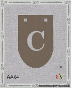 A taped needlepoint canvas with the design: Banner 18 mesh count Rounded C White on Brown.