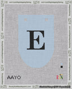 A taped needlepoint canvas with the design: Banner 18 mesh count Rounded E Black on Light Blue.