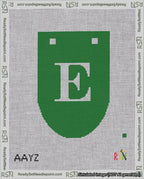 A taped needlepoint canvas with the design: Banner 18 mesh count Rounded E White on Green.