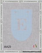 A taped needlepoint canvas with the design: Banner 18 mesh count Rounded E White on Light Blue.