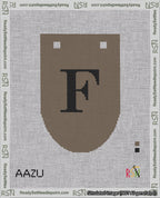 A taped needlepoint canvas with the design: Banner 18 mesh count Rounded F Black on Brown.